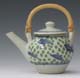 small teapot with cane handle